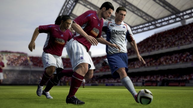 In-game action from FIFA 08 featuring soccer players on the field.
