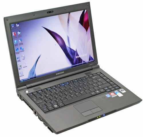 Samsung X22 laptop open on desk showing screen and keyboard.