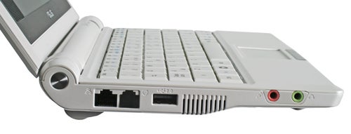 Asus Eee PC 4G 701 laptop with visible ports and keyboard.