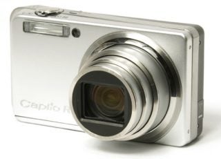 Ricoh Caplio R7 digital camera on white background.
