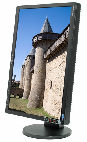 Samsung SyncMaster 245T monitor displaying a castle image.