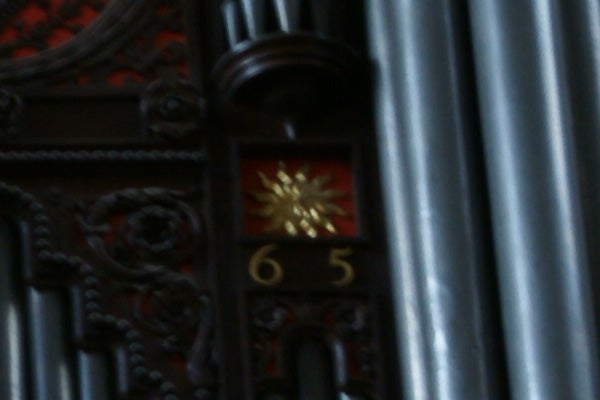 photo of a number plaque with the number 65.