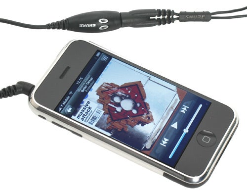 Shure mobile phone adapter connected to an iPhone.
