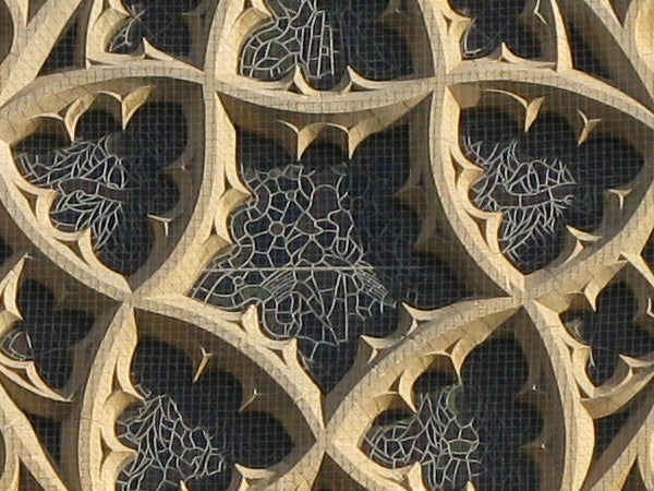 Close-up of intricate stone lattice work design.