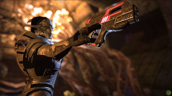 Character from Mass Effect aiming with a futuristic gun.Character from Mass Effect aiming with a futuristic weapon.