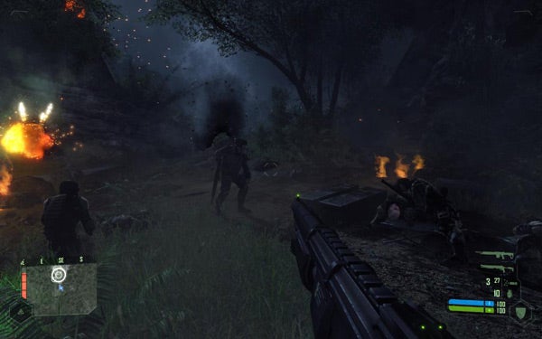 Screenshot of a night scene from the Crysis video game.Crysis game screenshot showing night combat scene with firearm.