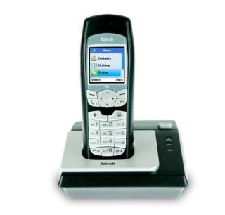 Aztech wireless IP telephone in charging dock with display screen.