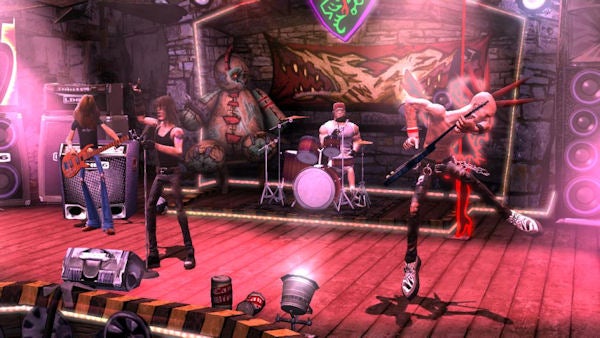 In-game band performing on Guitar Hero III stage.In-game screenshot of Guitar Hero III band performing on stage.