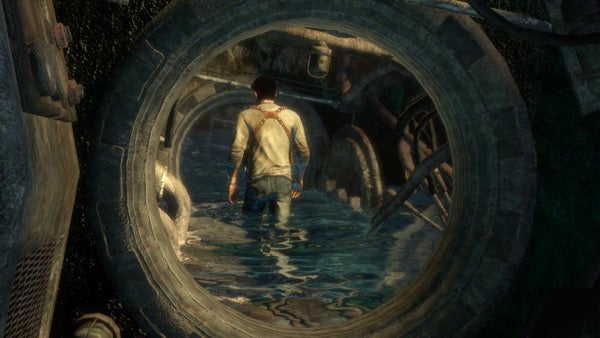 Character in water-filled tunnel from Uncharted: Drake's Fortune game.Screenshot from Uncharted: Drake's Fortune video game.