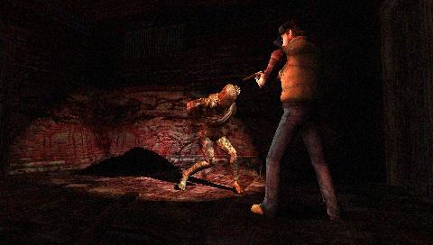 Screenshot of combat in Silent Hill: Origins video game.Silent Hill: Origins gameplay scene with character fighting a monster.