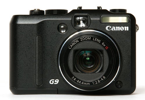 Canon PowerShot G9 digital camera frontal view on white background.Canon PowerShot G9 camera front view on white background.