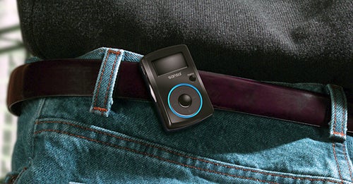 SanDisk Sansa Clip MP3 player attached to jeans belt loop.