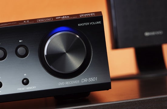 Onkyo DVD receiver DR-S501 with master volume knob.Onkyo DVD receiver DR-S501 with volume knob and speaker.