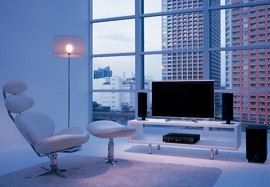 Onkyo LS-V501 DVD system in a modern living room setup.Onkyo LS-V501 DVD system in a modern living room setting.