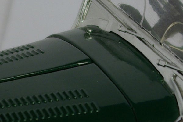 Close-up of Pentax K10D camera body detail.Close-up of Pentax K10D camera's grip and texture.