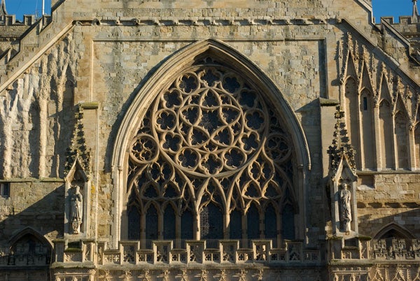 Photograph of an intricate cathedral window shot with Pentax K10D.Photo of a Gothic church window captured with Pentax K10D.