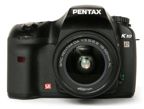 Pentax K10D Digital SLR camera with a standard lens.Pentax K10D digital SLR camera with lens attached.