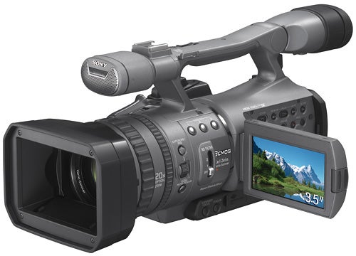 Sony HDR-FX7E camcorder with LCD screen and microphone.Sony HDR-FX7E camcorder with LCD screen open.