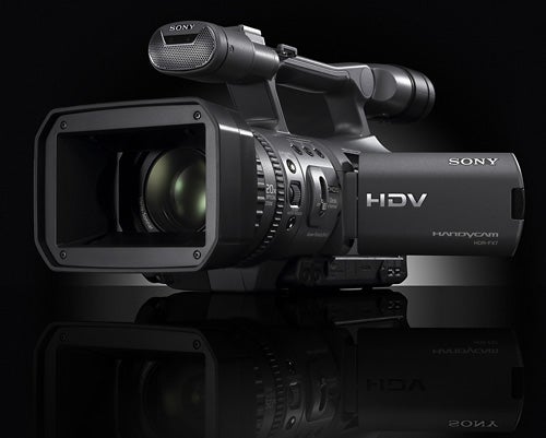 Sony HDR-FX7E camcorder with reflection on dark surface.
