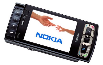 Nokia N95 8GB smartphone displaying handshake image on screen.