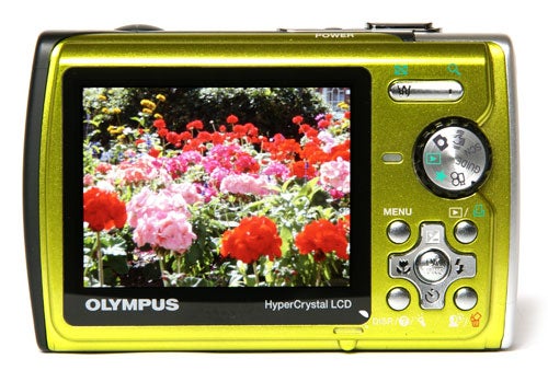 Olympus mju 790 SW camera displaying a colorful garden photo.Olympus mju 790 SW camera displaying flower image on LCD screen.