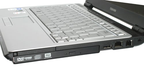 Toshiba Satellite U300-134 laptop with DVD drive visibleSide view of Toshiba Satellite U300-134 laptop with ports.