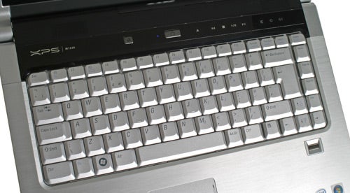 Dell XPS M1530 laptop keyboard and partial view of screen hinge.Close-up of Dell XPS M1530 laptop keyboard.