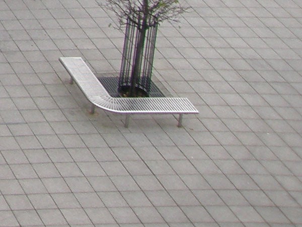 Photo taken with Olympus SP-560UZ showing bench and tree from above.Metal bench and tree from above, Olympus SP-560UZ image quality test.