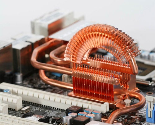 Close-up of MSI X48 Platinum motherboard with copper cooling pipes.Close-up of MSI X48 Platinum motherboard with copper heatsinks.