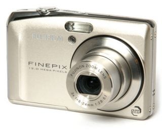 Fujifilm FinePix F50fd digital camera on white background.