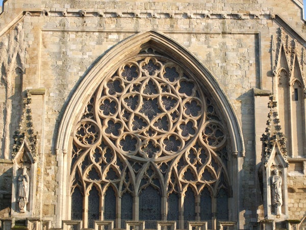 Detailed photo of Gothic church window architecture.Photo taken with Fujifilm FinePix F50fd of a detailed church window.