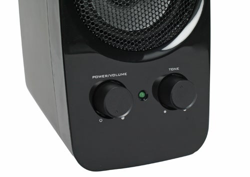 Close-up of Creative Inspire T10 speaker controls.Close-up of Creative Inspire T10 speaker with controls.