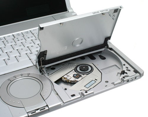 Panasonic ToughBook CF-Y7 with open drive bay and exposed internal componentsPanasonic ToughBook CF-Y7 with optical drive open.