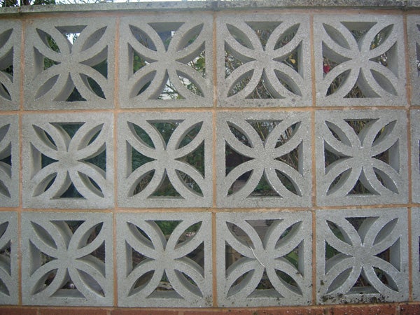 Decorative concrete block wall with symmetrical patterns
