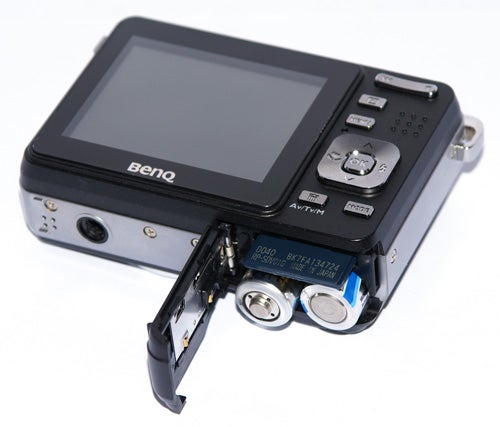 BenQ DC C1050 camera with open battery compartment.