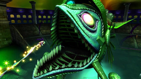 Screenshot of Nights flying towards a large fish-like enemy.Character flying towards a large fish-like creature in a video game.
