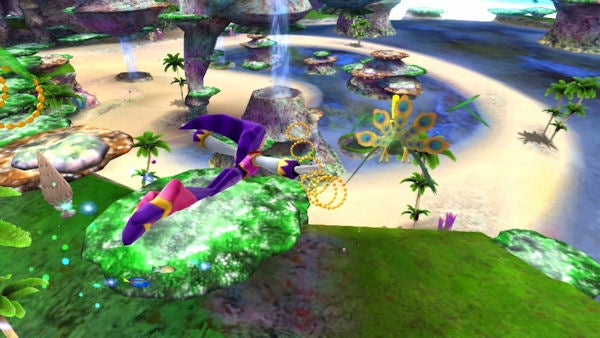 Screenshot from Nights: Journey of Dreams video game showing character flying.Nights flying in a colorful dream-like game environment.