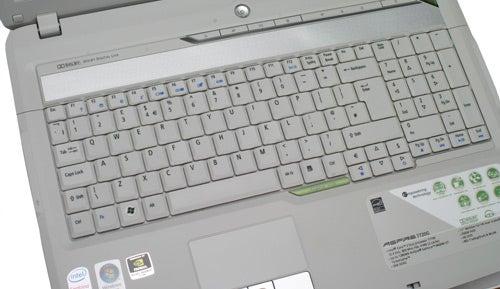 Acer Aspire 7720G laptop keyboard and touchpad close-up.Close-up of Acer Aspire 7720G laptop keyboard and stickers.