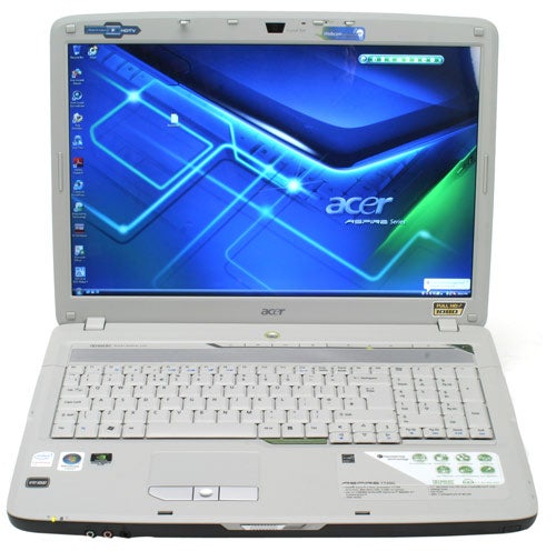 Acer Aspire 7720G laptop open showing screen and keyboard.Acer Aspire 7720G laptop open with screen on