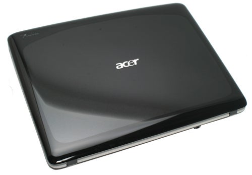 Acer Aspire 7720G laptop closed on white background.Acer Aspire 7720G laptop closed, showing logo on lid.