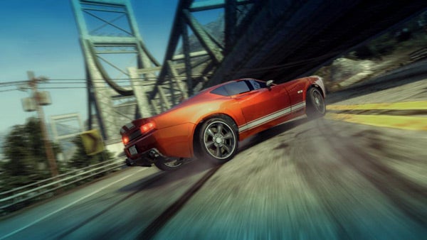 Orange sports car racing in Burnout: Paradise game.Screenshot of orange car racing in Burnout: Paradise game.