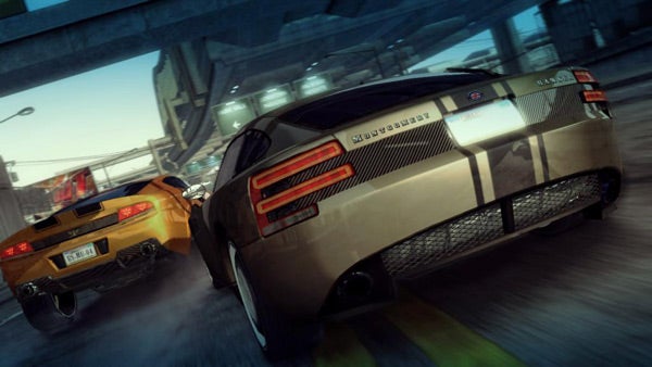 Two sports cars racing in Burnout: Paradise game.Screenshot from Burnout: Paradise showing high-speed car chase