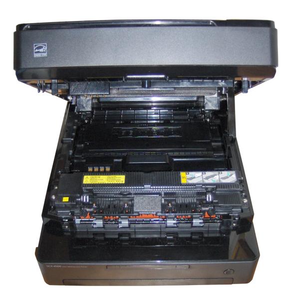Samsung SCX-4500 multifunction printer open showing internal components.