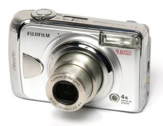 Fujifilm FinePix A920 digital camera on white background.