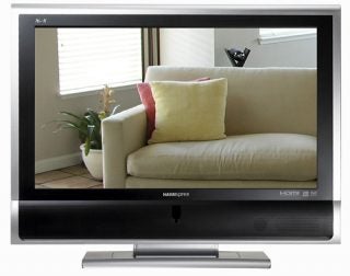 Hannspree XV32 GT 32in LCD TV displaying a living room scene.