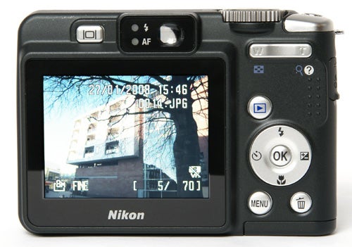 Nikon CoolPix P50 camera with a displayed image on screen.