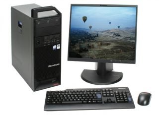 Lenovo ThinkStation S10 workstation with monitor, keyboard, and mouse.