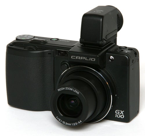 Ricoh Caplio GX100 camera with external viewfinder attached.