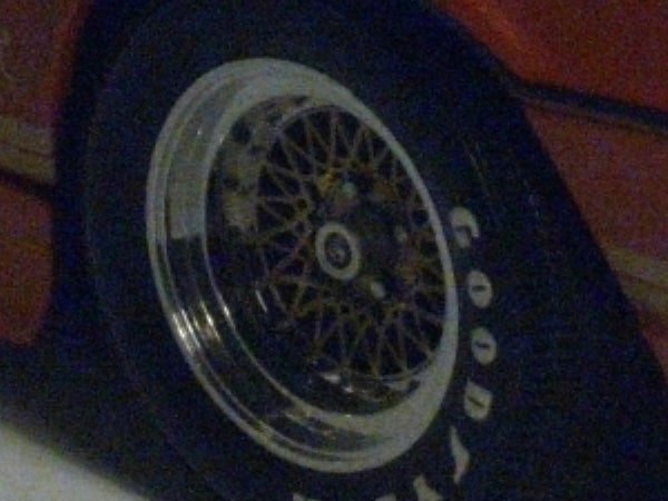 image of a car wheel and tire.
