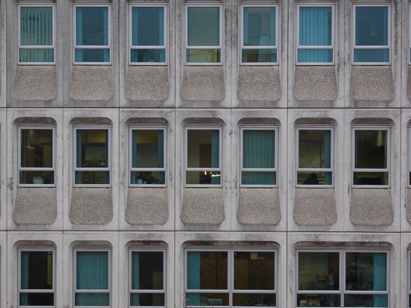 Facade of a building with patterned windows.